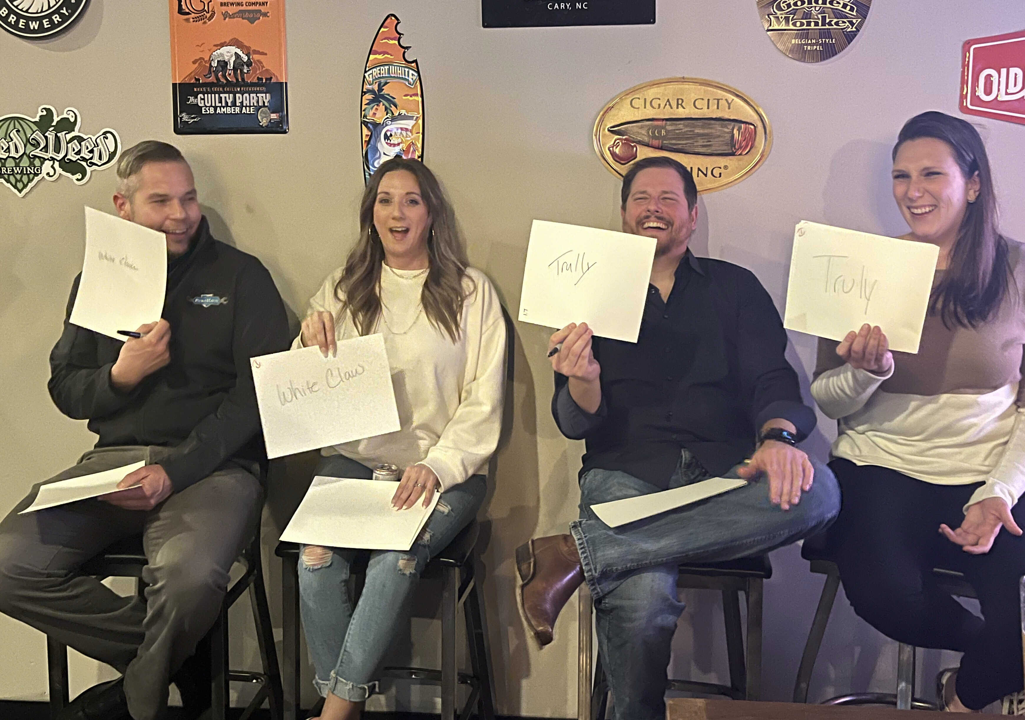 four members playing a guessing game